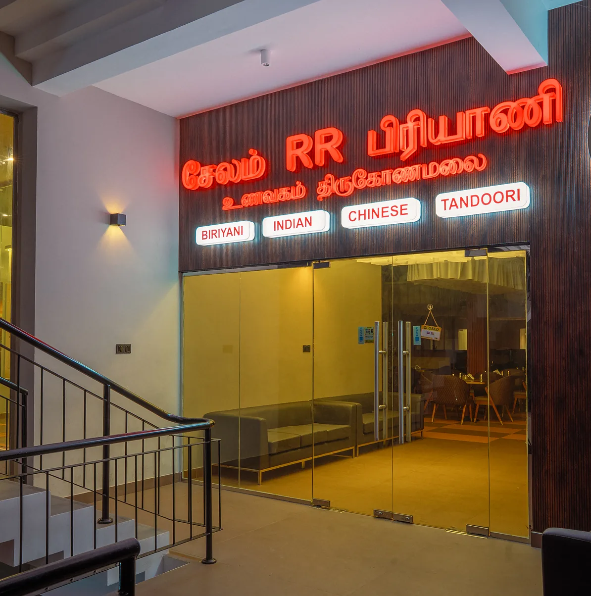 Illuminated Salem RR Biriyani sign above the restaurant entrance
